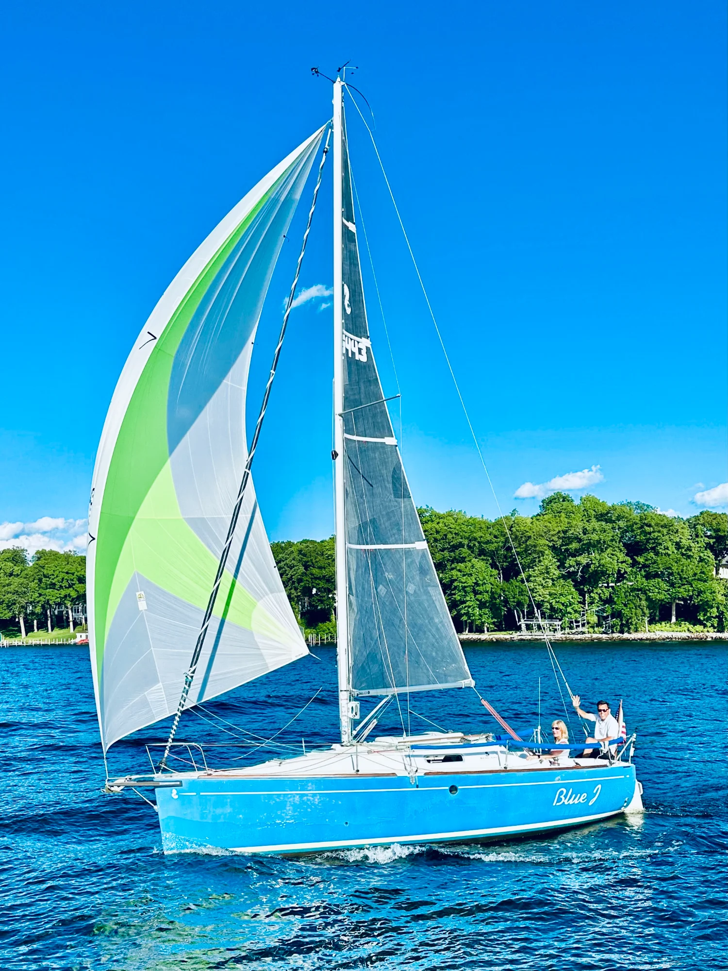 BlueJ sailing on Lake Minnetonka with spinnaker